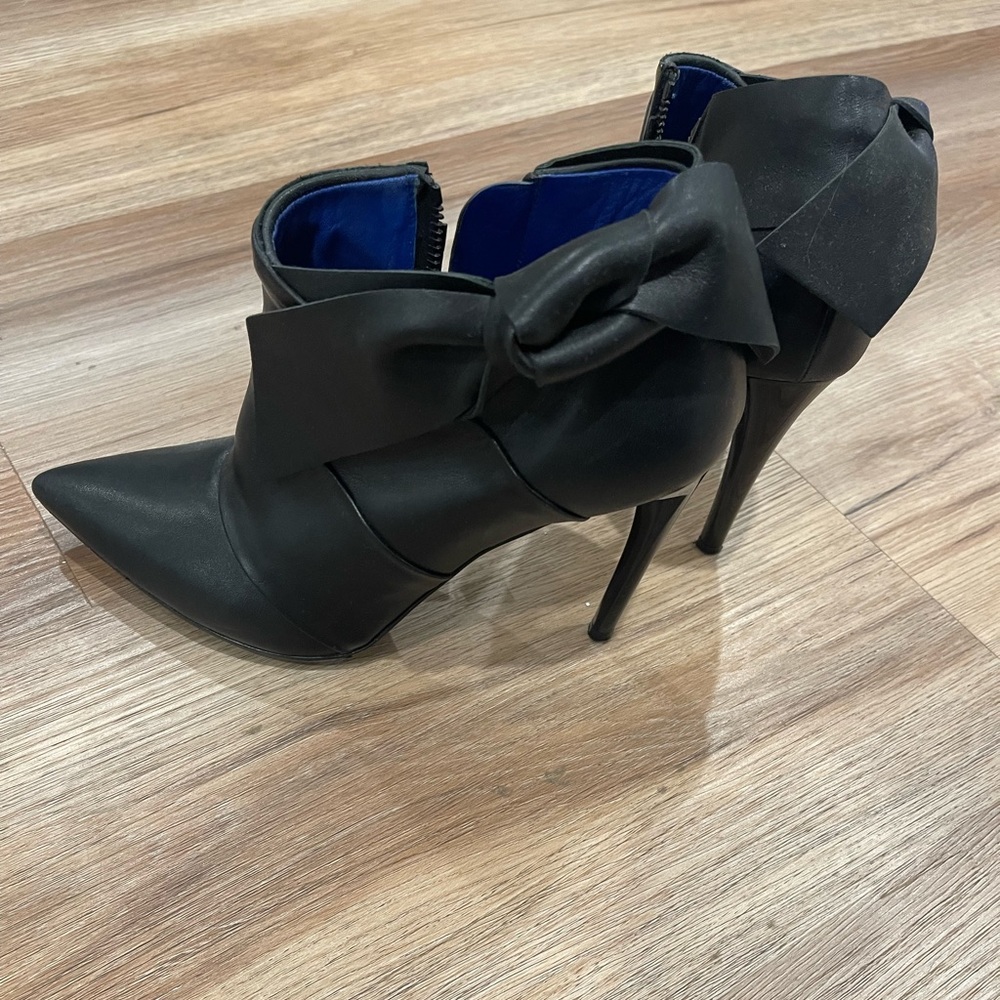 COPY - Black booties with side bow. Worn only once.